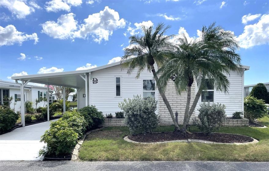 Welcome to this beautifully updated 2-bedroom, 2-bath manufactured home with breathtaking lake views, located in the highly desired community of Harbor Isles. This charming residence is a perfect blend of modern comfort and serene waterfront living.  

Step into the remodeled kitchen featuring elegant granite countertops, a new refrigerator, a stunning mosaic tile backsplash, and a convenient pantry with pullouts, offering both style and functionality. Both bathrooms have been completely renovated, showcasing new vanities and exquisite tile walk-in showers. The home boasts vaulted ceilings and sleek laminate floors, creating an open and inviting atmosphere.  

The true highlight of this property is the oversized, air-conditioned Florida room, where panoramic views of the lake provide the perfect backdrop for relaxation or entertaining guests. Step outside to a delightful patio overlooking the water – an ideal spot for enjoying your morning coffee or evening sunset. 

This home offers peace of mind with its many recent upgrades, including a new carport, siding, roof, and AC in the Florida room (all in 2023). The central AC was replaced in 2010 and the motor is one year old. The hot water heater is just two years old, and the updated windows enhance energy efficiency. A whole-house water softener adds an extra touch of convenience, while the enlarged outside shed provides ample storage space.  

Located in Harbor Isles, this vibrant, pet-friendly, land-owned 55+ community offers an active lifestyle with an array of resort-style amenities. Residents enjoy a heated pool and spa, fitness center, tennis courts, bocce ball, shuffleboard, and a clubhouse with a full calendar of social events. Outdoor enthusiasts will appreciate the scenic marina, kayak launch, and fishing opportunities. With its well-manicured landscaping and a welcoming atmosphere, Harbor Isles is a community where neighbors become friends.  

Don’t miss this opportunity to own a beautifully updated home with stunning lake views in one of the most sought-after communities around. Schedule your showing today!