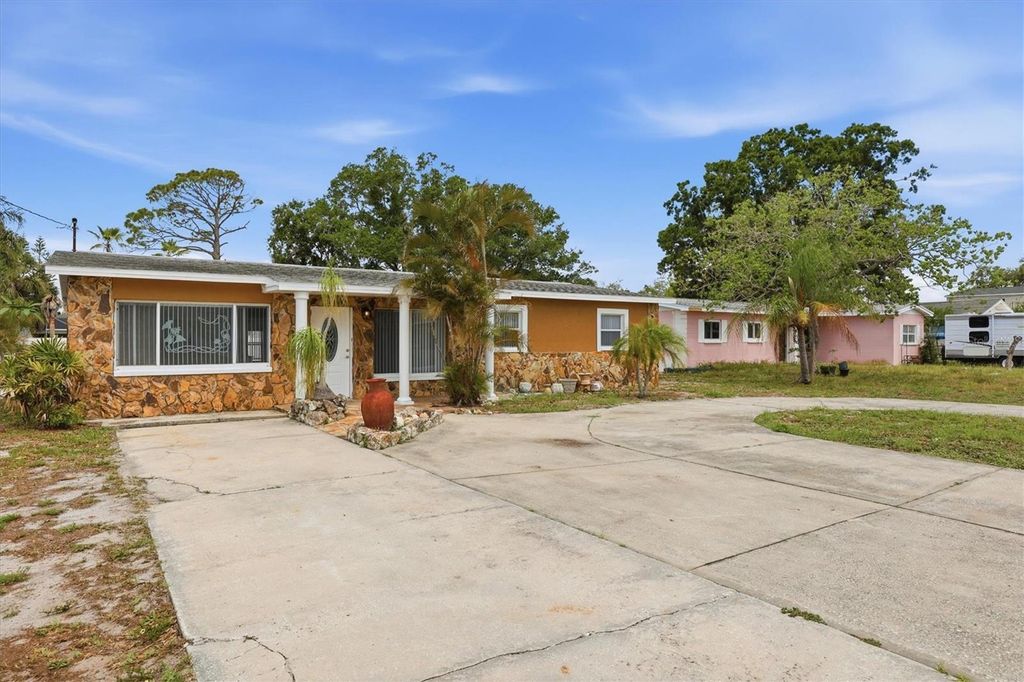 Photo of 721 Bayshore Drive, Tarpon Springs, FL 34689 (MLS # TB8500746)