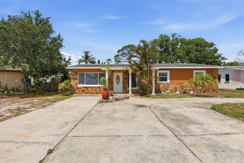 Photo of 721 Bayshore Drive, Tarpon Springs, FL 34689 (MLS # TB8500746)