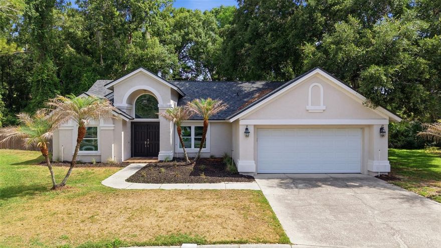 Tucked away on a quiet cul-de-sac in sought-after Tampa Palms, this home offers the perfect blend of privacy and lifestyle. Backing up to peaceful wooded views with no rear neighbors, the backyard creates a serene setting ideal for relaxing or entertaining. Located in one of Tampa’s most established master-planned communities, residents enjoy access to everything Tampa Palms is known for — including golf, parks, walking trails, top-rated schools, dining, and convenient access to shopping and major highways. Whether you're looking for tranquility, community amenities, or a prime Tampa location, this home delivers it all. Residents enjoy an exceptional lifestyle with access to multiple community parks, scenic walking and jogging trails, and a 45-acre nature preserve along the Hillsborough River featuring canoe access, hiking trails, and camping. Compton Park serves as the community hub with a 10,300-square-foot clubhouse, heated Junior Olympic pool, tennis and pickleball courts, basketball courts, playgrounds, and open green spaces. Additional neighborhood amenities include conservation areas with biking trails, picnic pavilions, and beautifully maintained parks throughout the community. Conveniently situated approximately 25 minutes from Downtown Tampa with easy access to I-75 and I-275, its location makes commuting easy and puts you close to everything Tampa Bay has to enjoy.