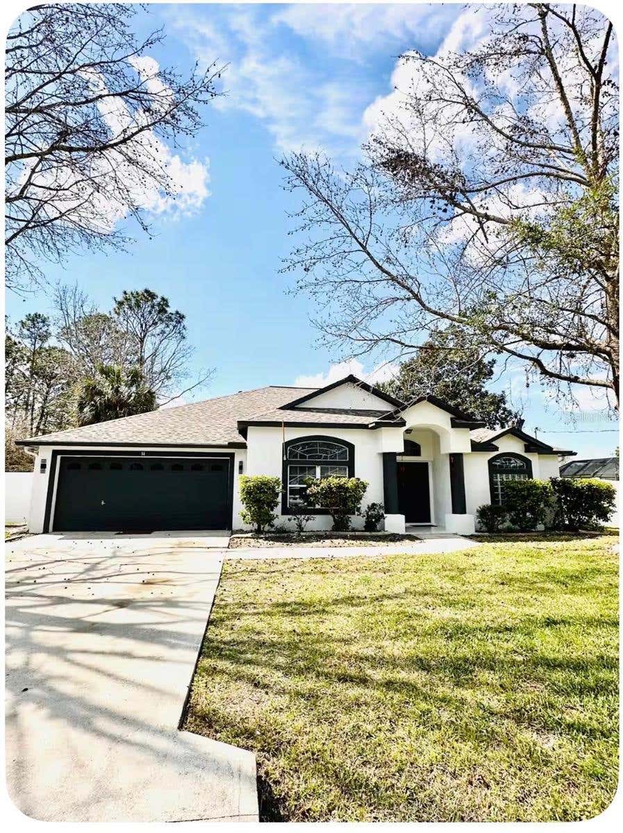 Photo of 14 Wayland Place, Palm Coast, FL 32164 (MLS # FC320058)