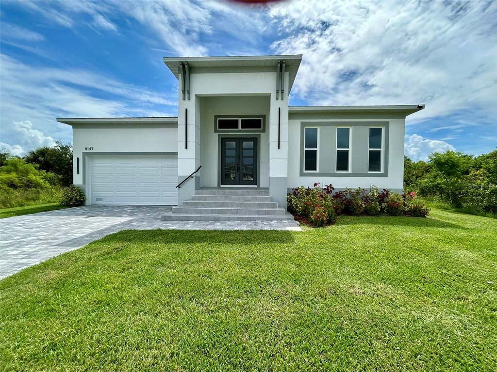 Photo of 8147 Tracy Circle, Port Charlotte, FL 33981 (MLS # C7529271)