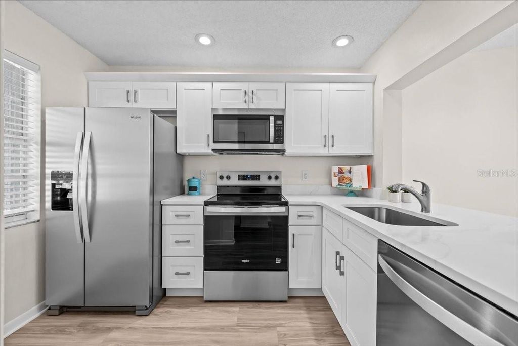 Photo of 1390 Oak Hill Drive #202, Dunedin, FL 34698 (MLS # TB8498594)