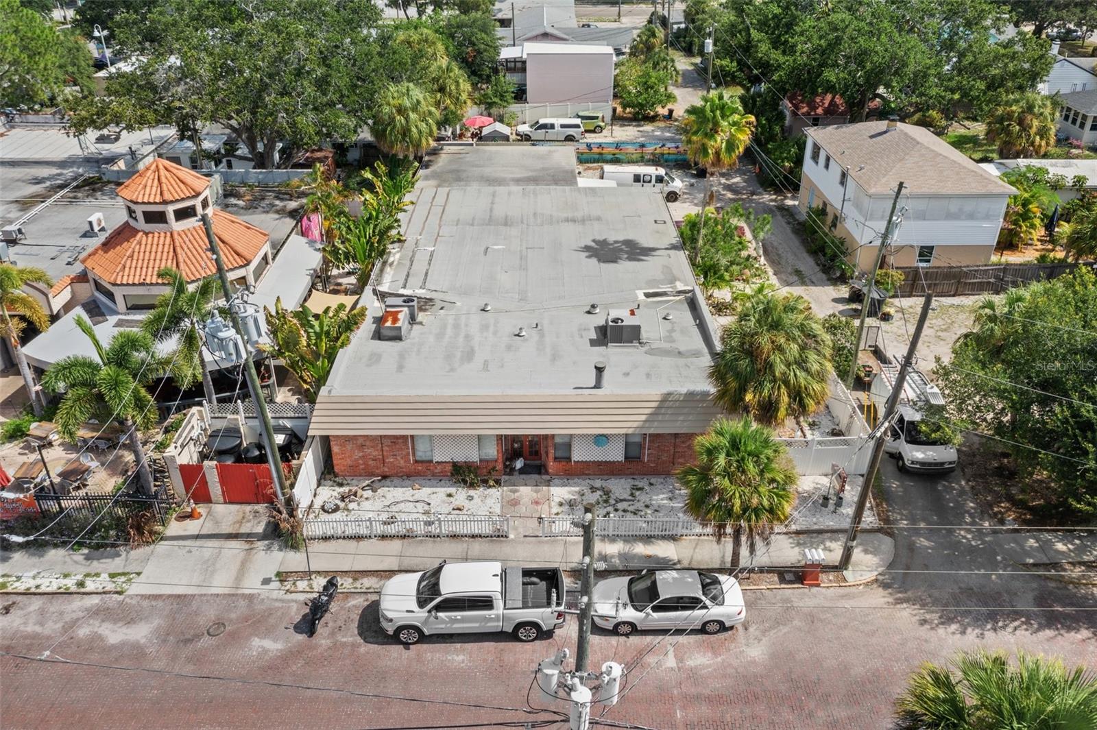 PRIME GULFPORT ART'S DISTRICT LOCATION! Near the busy waterfront with many distinguished bars, restaurants, shops and boutiques. Close proximity to the beautiful sandy Gulfport beach and pier. This commercial, mixed-use building Includes, two - one bedroom, one bath apartments and four Individual workshop/studios. This property can be used for commercial and or residential purposes. The surrounding businesses bring a significant amount of foot traffic year-round. This is a rare Investment opportunity that will pay off for years to come.