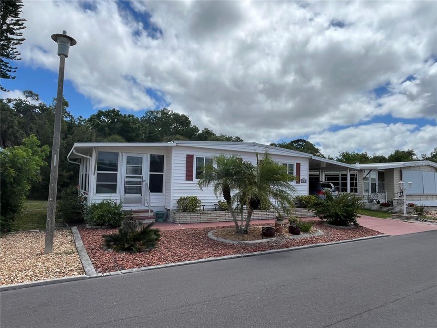 A Large home IN THE DOG SECTION, private rear yard with patio, Newer windows, vinyl siding, roof over in 2025, AC 2014, newer interior electric panel, this home has tons of walk in closets and additional storage closets, beautifully landscaped front garden too, this fully furnished home is ready to move right in.
Venice Isle is the premier resident owned over 55 Mobile home Park in Venice.  There are close to 1000 homes with the most active residents. There is always something going on for you to do. We have many Park gatherings and first rate shows on site. The Park has every amenity you can imagine. Come take a walk through both of our 2 clubhouses and make yourself at home. The Park has 2 tennis courts, a fitness center, 2 heated pools, 2 hot tubs, saunas, putting greens, shuffleboard, Bocce ball, miniature golf, art rooms, pool room, TV lounges, card rooms, library, horseshoes, ceramic kilns, 2 huge ballrooms, Sunday services and much more!