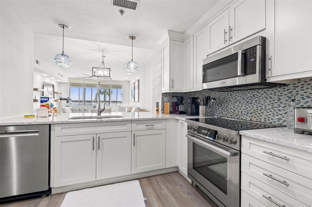 Photo of 615 Dream Island Place #210, Longboat Key, FL 34228 (MLS # TB8503989)