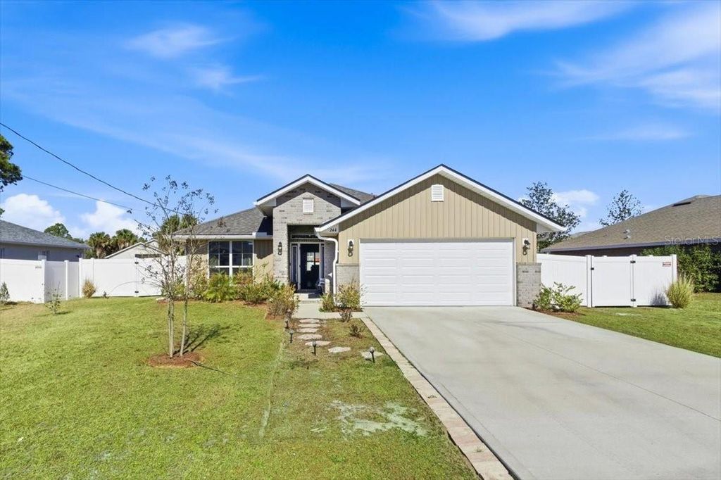 Photo of 244 Bird Of Paradise Drive, Palm Coast, FL 32137 (MLS # FC315869)