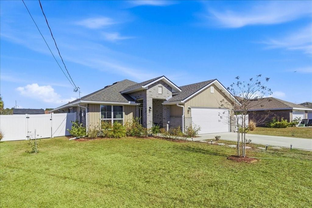 Photo of 244 Bird Of Paradise Drive, Palm Coast, FL 32137 (MLS # FC315869)