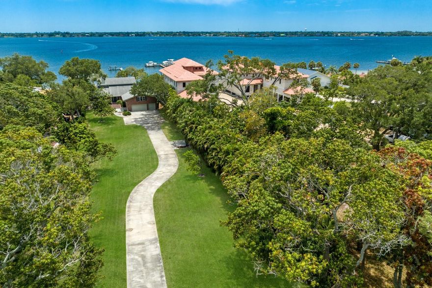 STUNNING TWO STORY CUSTOM BUILT POOL HOME ON OVER ONE ACRE DIRECTLY ON THE MANATEE RIVER! ENJOY THE PEACE AND PRIVACY OF THIS HOME WITH YOUR OWN PRIVATE BEACH! Boasting 4,200 sq. ft. of luxurious living space, this five-bedroom, four-bathroom residence offers a harmonious blend of modern amenities and timeless charm. Step inside to find high-quality finishes throughout, including impact windows, wood floors, crown molding, ample storage space and built-ins. The spacious living area features a cozy wood-burning fireplace, perfect for relaxing evenings. The gourmet kitchen is a chef’s dream, equipped with beautiful wood cabinets, granite countertops, stainless steel appliances, a Sub-Zero refrigerator, a wine refrigerator, and a hood over the cooktop. There is also a convenient eat-in space and a built-in desk for added functionality. The large master bedroom, located on the first level, includes a newly renovated master bathroom. Another bedroom on this level is currently being used as a TV room, offering flexibility for various needs. Upstairs, you’ll find three additional spacious bedrooms and two bathrooms, along with a versatile bonus room that can be used as a theater room, craft room, playroom, or anything you desire. Each bedroom offers full views of the Manatee River, ensuring a serene backdrop to everyday life. Outdoor living is equally impressive with a large back porch accessible through French doors from the formal dining room and living room. The porch provides stunning views of the River and overlooks a large saltwater pool with a newer picture window cage ensuring maximum views! Beyond the pool lies your own private beach and dock, perfect for enjoying the waterfront lifestyle. Located on Snead Island, one of Florida’s west coast’s undiscovered treasures, this home offers an array of activities. Enjoy dining and boating at the local yacht club, biking or kayaking on the trails of the 365-acre Emerson State Park, or visiting the local stables. Snead Island truly offers something for everyone, providing a unique blend of natural beauty and modern luxury.
This exceptional home is a rare find, offering the best of both worlds—tranquility and active outdoor living. Don’t miss your chance to own a piece of paradise on Snead Island.