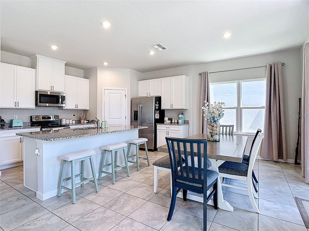 Photo of 2107 Desert Rose Dr, Davenport, FL 33837 (MLS # S5146128)