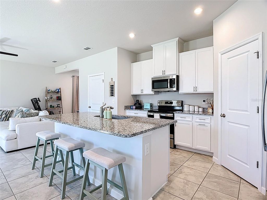 Photo of 2107 Desert Rose Dr, Davenport, FL 33837 (MLS # S5146128)