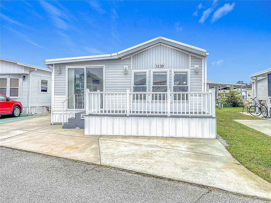 BRIGHT AND CHEERFUL MOBILE HOME IN ACTIVE 55+ COMMUNITY. One bedroom, one bathroom home sold turn-key. Enjoy the ample front deck on this welcoming home! When you enter the front of the home, there is a welcoming bonus area that could be used as dining or extra seating. Enjoy all the natural light in the eat-in kitchen and connected living room. The large family room has sliding doors that offer separation for sleeping options, and could easily become a true second bedroom. The bathroom has a Bathfitter shower and linen storage. The tilt-in vinyl windows add to the ease of maintenance. This well-kept property features a covered parking area which is currently used for outdoor seating. Room to park multiple vehicles. Shed with laundry and extra storage. Central A/C. Sold for CASH ONLY. Sugar Creek Country Club has LOW HOA FEES OF $525 PER QUARTER which include internet, cable, grass mowing, water, sewer and trash. There are 2 swimming pools, heated spa, clubhouse, tennis, pickleball, shuffleboard, a fitness room, and workshop. There is an active social calendar during the winter months. SO MUCH TO OFFER! Sorry this is not a dog lot.