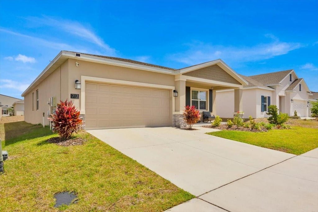 Photo of 717 Citrus Reserve Boulevard, Davenport, FL 33837 (MLS # O6439114)
