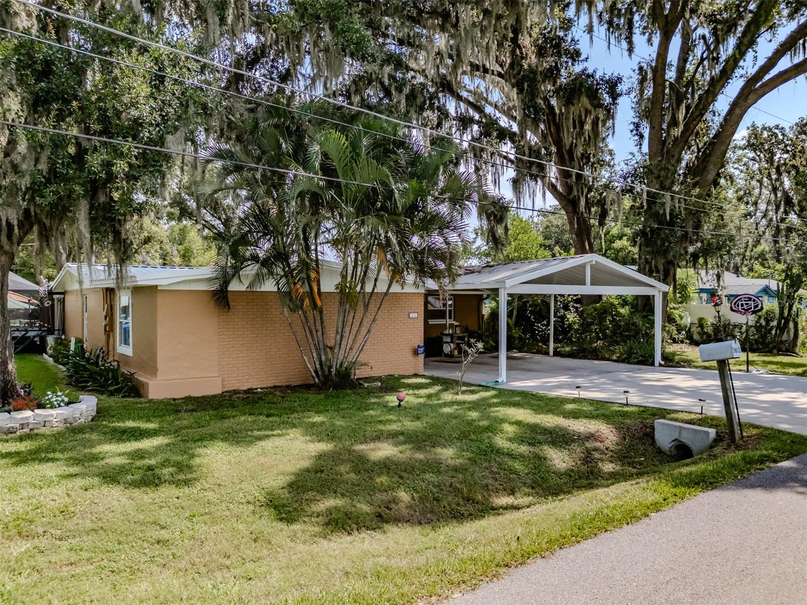 NO HOA!! NO CDD!! This beautiful home is located in Plant City; near shopping, dining, and I-4. Making the commute to Tampa or Orlando easy! This updated home is a 3 bedroom, 2 bath and sits on a spacious .80-acre lot in a well-established community. Home features a sprawling floor plan with plenty of entertaining and dining space. Living room has a beautiful wood burning fireplace, granite countertops throughout, and a bonus room. This home has an open kitchen, lots of counter & cabinet space and includes a breakfast bar. After a stressful day, relax in the alluring free standing clawfoot tub. The outdoor space has lots of potential! Enjoy the enclosed screened in-ground pool. The large backyard is fenced, and home has a huge, detached workshop/garage- which is every man's dream! Plenty of room for all your storage needs! Property is flood zone X!! HIGH AND DRY!! Country living in a quiet neighborhood. No HOA! Additional features include fresh exterior paint (March 2025) & interior paint, re-roofed (Feb 2025), re-piped in 2015, installed new doors on workshop in 2020. Irrigation for front lawn and half the rear lawn (keeping the lawn healthy without eating your budget; sprinkler system is run off the onsite well). A/C installed in 2017 and a large double oven in the kitchen. Schedule your appointment today and enjoy your piece of the American dream tomorrow.