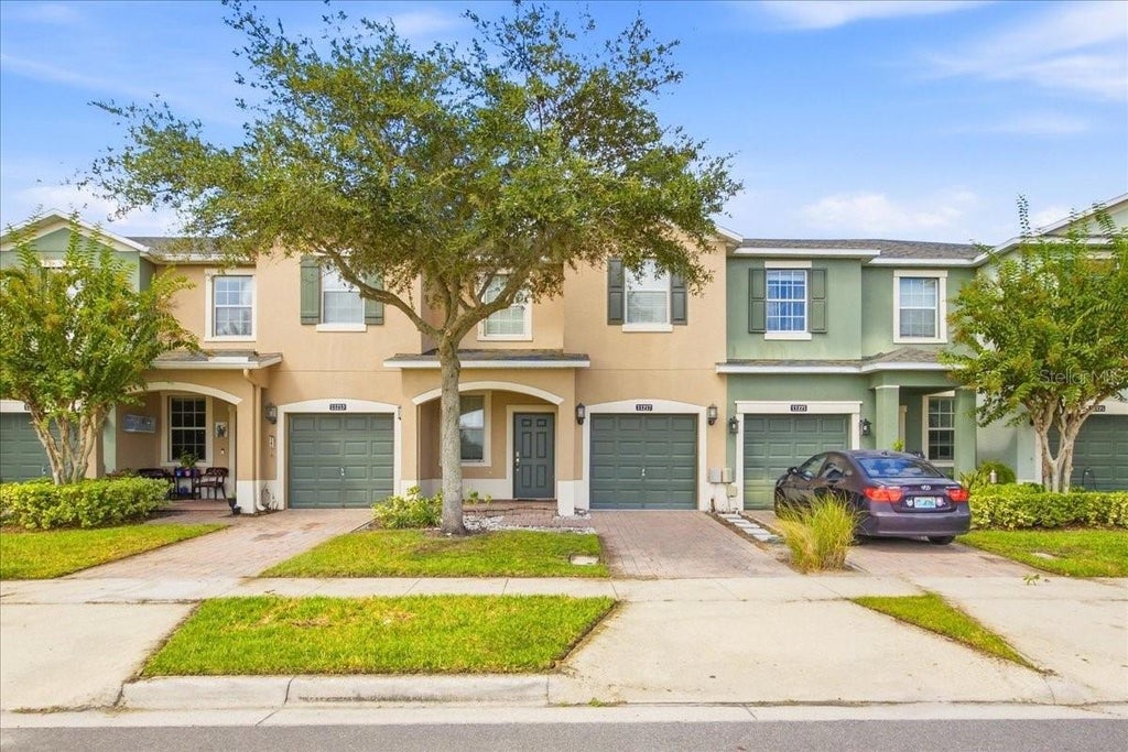 Photo of 11217 Savannah Landing Circle, Orlando, FL 32832 (MLS # O6444565)
