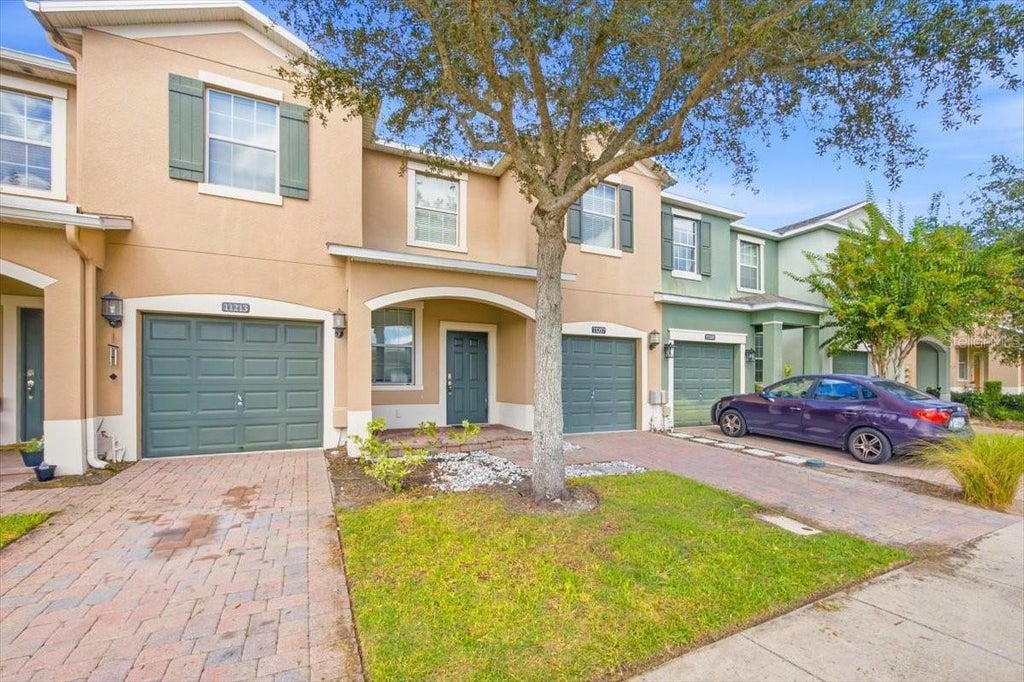Photo of 11217 Savannah Landing Circle, Orlando, FL 32832 (MLS # O6444565)