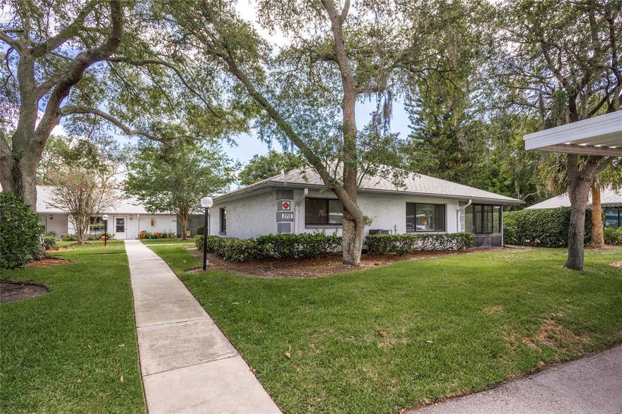 Here’s your opportunity to rent a 2-bedroom, 2-bathroom villa in the highly desirable Countryside area. Opportunities like this are rare. Step into a spacious living room featuring laminate flooring, perfect for relaxing or entertaining, with abundant natural light flowing into the eat-in kitchen with tile flooring. The dining and sitting areas open to a sliding glass door leading to a fully enclosed Florida room, an ideal space to unwind and enjoy beautiful sunset evenings. The two generously sized bedrooms are thoughtfully positioned on the opposite side of the villa for added privacy, and both bathrooms feature tile flooring along with ample counter space and storage. Additional highlights include an in-unit laundry room and the option to rent the property furnished or unfurnished, along with access to a community pool and clubhouse. Conveniently located in the heart of Countryside, this villa is just minutes from Countryside Mall for shopping and dining, less than 15 minutes to the Dunedin Causeway, and under 30 minutes to Tampa International Airport, with beaches and parks nearby to enjoy all that Florida living has to offer. This villa will not last long, schedule your showing today.