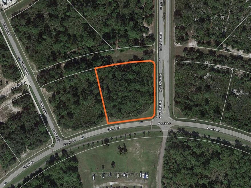 Location, location, location! Look at this beautiful piece of vacant land in the very center of Rotonda West. The preferred X flood zone will save thousands in building costs and ongoing insurance costs! This lot is favorably zoned OMI which has many commercial uses like Office, Medical, and Institutional as well as residential uses like Multi-Family and Single Family. If you choose to use the conditional zoning option of Multi-Family the density can be up to 10 units per acre. For this 1.93-acre parcel, you could theoretically put 19 units on it. Or you could build one magnificent home on a huge 1.93-acre lot. The choice is yours, commercial or residential. All utilities are here including water, sewer, cable, broadband internet, electricity, and phone. Seller financing is available.