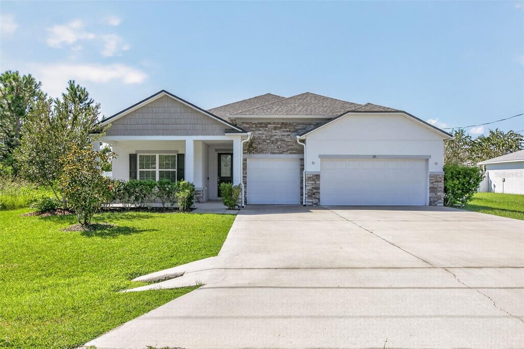 Photo of 21 Lancelot Drive, Palm Coast, FL 32137 (MLS # V4951589)