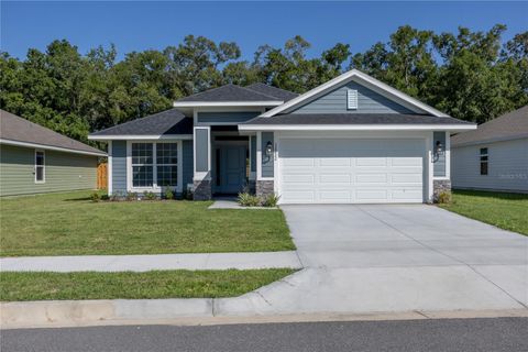 Photo of 12822 NW 162nd Drive, Alachua, FL 32615 (MLS # GC526781) Photo of 12822 NW 162nd Drive, Alachua, FL 32615 (MLS # GC526781)