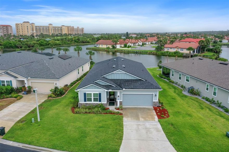 Are you looking to have a beautiful lakeview and put on your flip flops to walk to the beach to watch the sunrise over the ocean? Minutes to ICW to relax on the covered boat dock Offering kayaking, canoeing &  fishing. THEN this beautiful updated home in a GATED community is waiting for your arrival. SELLER transferred so wants to make a DEAL! Builders warranties included! UPGRADES GALORE! Must see to appreciate. Gourmet kitchen with with spacious quartz countertops, S/S appliances, built in microwave and cooktop, w/vented hood. The covered lanai has a hot tub to relax while over looking the lake. Media room (4th bedroom w/ armoire) can be your gym, home office or playroom for the youngsters. Interior laundry room and garage has plenty of storage. Community offers pickleball, tennis, volleyball, oceanside pool! Close to walking and biking trails. 30 minutes to historic St. Augustine and Daytona Beach for the Nascar and biking fans. Make an appt today because at this price this home will not last long!