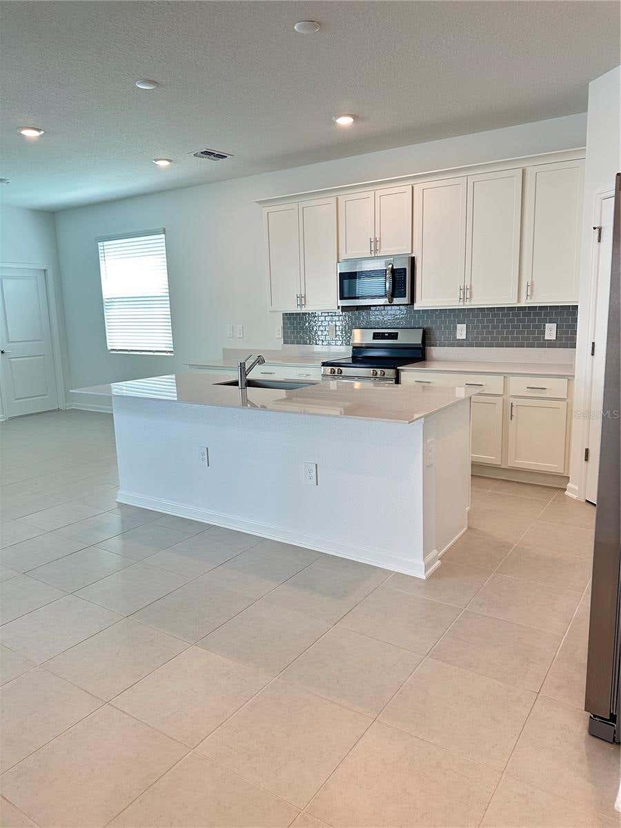 Photo of 2981 Good Vibes Way, Clermont, FL 34714 (MLS # O6430460)