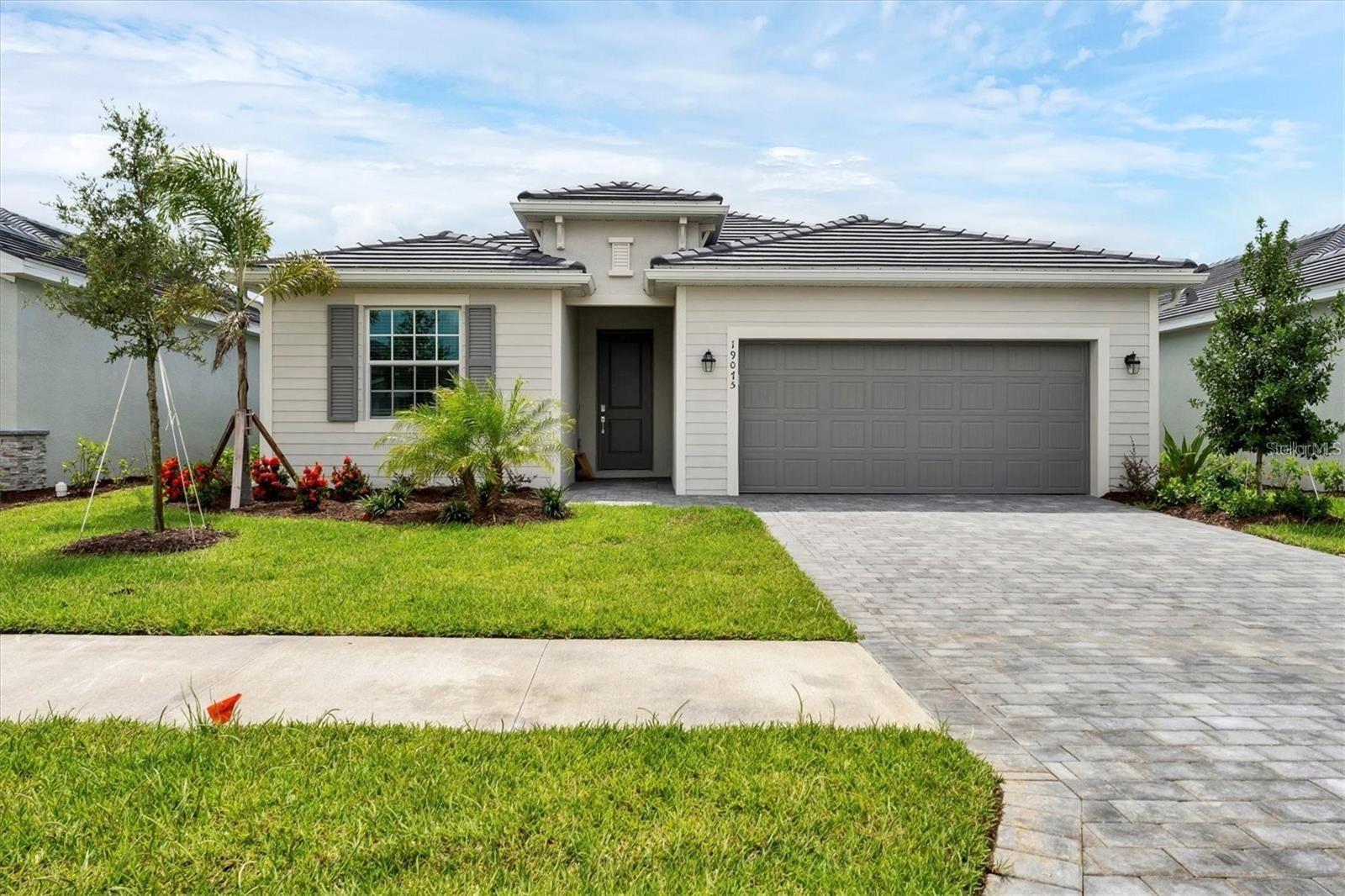 Welcome to exceptional living in Wellen Park, Southwest Florida's premier master-planned community rivaling the prestige of Lakewood Ranch. This 2024-built residence offers a sophisticated backdrop for the area's spectacular sunsets, with peaceful lake views that transform your backyard into a daily retreat. The community's thoughtfully designed landscape attracts a diverse, cosmopolitan population, creating a vibrant tapestry of cultures and lifestyles. The time you'll enjoy the most is sunset. As the sun descends, your private lakefront setting provides nature's daily masterpiece—a serene display of colors reflecting off tranquil waters. This flourishing community has emerged as Southwest Florida's answer to Lakewood Ranch, attracting discerning residents from across the globe who seek an elevated living experience.
Convenience defines daily life here, with Costco and Publix within walking distance, and the pristine Gulf beaches just 15 minutes away. The community's educational infrastructure is comprehensive, featuring highly-rated schools at all levels. Downtown Wellen's vibrant atmosphere offers residents a sophisticated urban experience without sacrificing the area's natural charm.
The location offers an ideal balance of tranquility and accessibility, with premium shopping destinations like Costco and Publix mere moments away. The educational landscape is equally impressive, featuring a full spectrum of excellent schools. The presence of the Atlanta Braves Spring Training facility adds a unique dimension to the community's amenities, while Downtown Wellen provides a sophisticated hub for dining, shopping, and social engagement.
Educational excellence is at your doorstep, with top-rated elementary, middle, and high schools' mere minutes away, complemented by proximity to higher education institutions. The heartbeat of the community, Downtown Wellen, provides a sophisticated mix of dining, shopping, and entertainment options. Sports enthusiasts will appreciate the Atlanta Braves' Spring Training facility, adding a distinctive dimension to the community's recreational offerings.