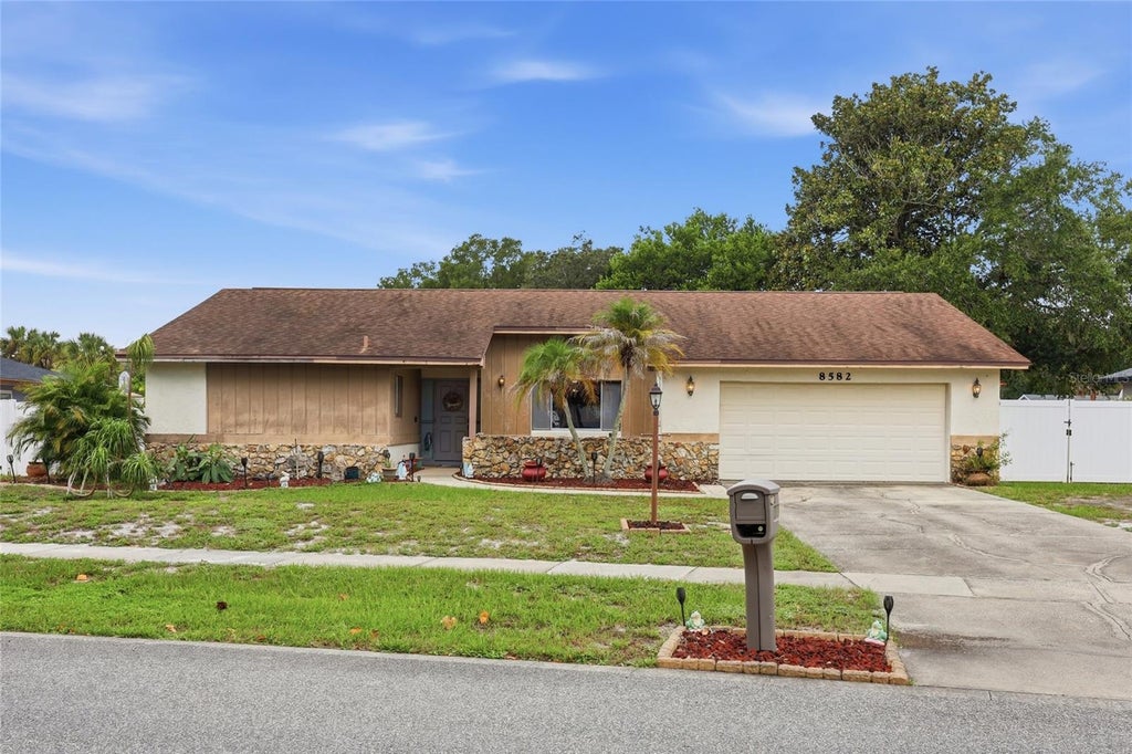 Photo of 8582 Cedar Cove Drive, Orlando, FL 32819 (MLS # O6440595)