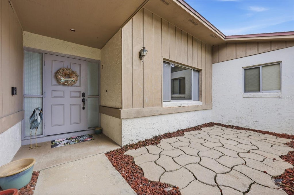 Photo of 8582 Cedar Cove Drive, Orlando, FL 32819 (MLS # O6440595)