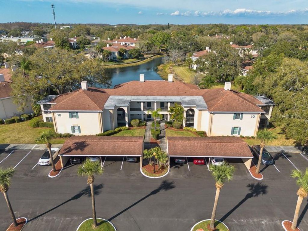 Photo of 10336 Carrollwood Lane #106, Tampa, FL 33618 (MLS # TB8480334)