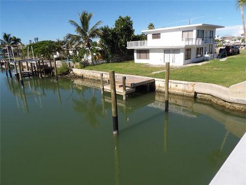 Photo of 497 Normandy Road, Madeira Beach, FL 33708 (MLS # TB8431677)