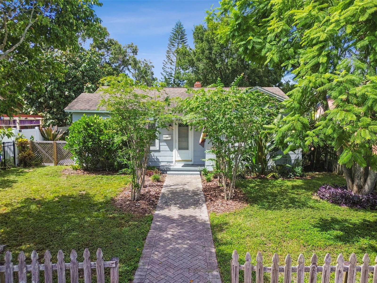 Charming 2-bed, 1-bath bungalow in Central Oak Park—ready for immediate move-in. This well-maintained, one-story home built in 1941 features a convenient layout, including a versatile bonus room with indoor laundry at the rear of the home. It offers hardwood floors, an eat-in kitchen, central HVAC, and some modern appliances. Set on a generous 6,512 sq ft fenced lot with alley access, this property provides ample outdoor room—ideal for RV/boat storage or potential An accessory dwelling unit (ADU) or pool/play area. Located outside of flood zones and free of any HOA, the home is just minutes from downtown, beaches, airports, dining, and shopping.