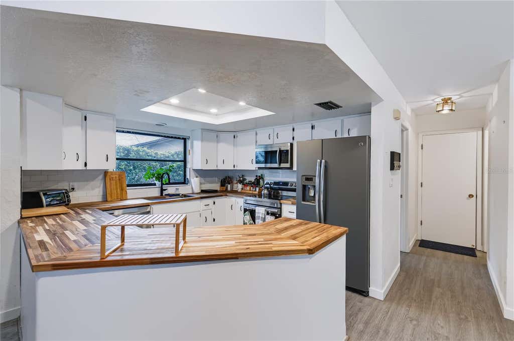 Photo of 9520 Lake Christina Lane, Port Richey, FL 34668 (MLS # TB8534913)