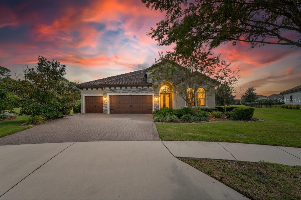 This stunning WestBay Biscayne I model truly has it all! Perfectly situated on a quiet cul-de-sac within the gated community of Anclote Reserve, this home offers the ideal blend of privacy, luxury, and functionality. Featuring four spacious bedrooms, three full baths, newer custom office and a three-car garage, it’s set on an impressive large pie-shaped lot with breathtaking water and conservation views — and no rear neighbors.  Step inside to discover an inviting wide-open entry with high and tray ceilings that create a bright, airy atmosphere. The home’s saltwater pool and beautiful outdoor living area with a fully equipped outdoor kitchen and gas grill make it perfect for entertaining or simply relaxing in your own private paradise.  Inside, you’ll find upgrades throughout — high-end tile and luxury vinyl plank flooring, 7¼” baseboards, crown molding, newer water softener, remote blinds in the primary bedroom, indoor central vacuum system, and king-sized bedrooms. The gourmet kitchen is a chef’s dream, featuring stainless steel appliances, custom cabinetry, a huge island, and a spacious walk-in pantry.
Additional highlights include a well-designed laundry room with ample storage, and a three-car garage with epoxy floors and overhead storage racks.  Residents of Starkey Ranch enjoy resort-style amenities including pools, playgrounds, dog parks, community gardens, and miles of scenic trails. Conveniently located near shopping, dining, medical facilities, major highways, Tampa, and the area’s finest beaches — this home truly offers the best of Florida living.  Don’t miss the opportunity to make this exceptional home yours — schedule your private tour today!