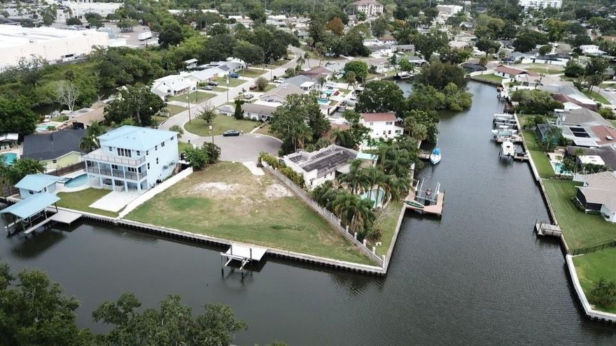 8719 Driftwood Drive – Tampa, FL 33615
Waterfront Lot | 0.28 Acres | 166 Feet of Waterfront | Bay Crest Community | No HOA

Discover an exceptional opportunity to own a 0.28-acre waterfront lot in the highly desirable Bay Crest community of Tampa — a neighborhood known for its no HOA, no deed restrictions, and true boating lifestyle. With 166 feet of waterfrontage and direct access to Old Tampa Bay, this property offers the perfect canvas to design and build your custom coastal dream home.

Bay Crest residents enjoy a private community boat ramp, giving you easy access to both Downtown Tampa and Downtown St. Petersburg — you can even attend a Tampa Bay Lightning game by boat! Spend your weekends cruising to local favorites like Bahama Breeze, Hula Bay, Salt Shack, Safety Harbor, and the St. Pete Pier, all just a short ride away.

Perfectly situated for both lifestyle and convenience, this location puts you close to everything — the Veterans Expressway, I-275, International Plaza, Westshore Business District, Downtown Tampa, and Tampa International Airport, just 10 minutes door to door. You’ll also find nearby Rocky Point Golf Course, Skyway Park’s sports and tennis facilities, Berkley Prep Private, and Tampa Bay’s best beaches, dining, and entertainment.

A rare blend of location, lifestyle, and potential — this waterfront property is ready to bring your dream home to life. Owner may be able to assist in the development of the lot under a separate agreement.