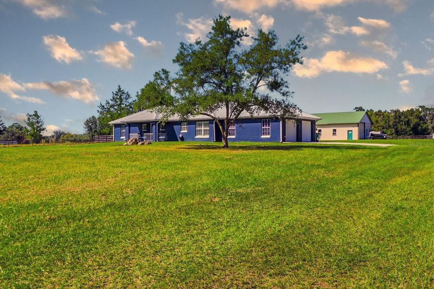 Welcome to Your Country Escape
Nestled in the serene countryside of Summerfield, this charming mini-farm at 5485 14th St offers the perfect balance of rural tranquility and practical amenities. Spread across lush pastures and open sky, it’s an ideal setting for equestrian pursuits, small-scale farming, or simply living your “country home” dream.
Property Highlights
• A generous parcel of land that invites paddocks, pastures, and wide-open vistas.
• Structures designed for farm life — barns, stables or out-buildings ready for livestock, tack rooms or equipment.
• A comfortable residence situated to enjoy views of your land, yet close enough for modern convenience.
• Mature landscaping, peaceful surroundings, and the freedom of A-zoned rural living.
• Convenient access to local amenities while feeling removed from the hustle.• Wake up to the sound of roosters or gentle horses grazing just outside your window.
• Spend your days maintaining pastures, checking on animals, or simply relaxing on a veranda with a view of the sunset.
• With abundant space, you can expand: create vegetable gardens, fruit trees, chicken coops, or even install an arena for riding and training.
• The property offers flexibility: work from home, host family gatherings under the oaks, or build the workshop you’ve always wanted.
Location & Opportunities
Located in the heart of Summerfield’s rural belt, yet within easy reach of nearby towns, shopping and major highways — you’re well-positioned for both lifestyle and convenience. Whether you’re an experienced equestrian, a hobby farmer, or simply seeking more elbow-room and nature’s pace — this mini-farm delivers.  Please see photos and attachments for details on major systems, and improvements/upgrades to the home. Close to The Villages and I-75.  SEE PHOTOS FOR INFO ON MAJOR SYSTEMS, UPGRADES/IMPROVEMENTS