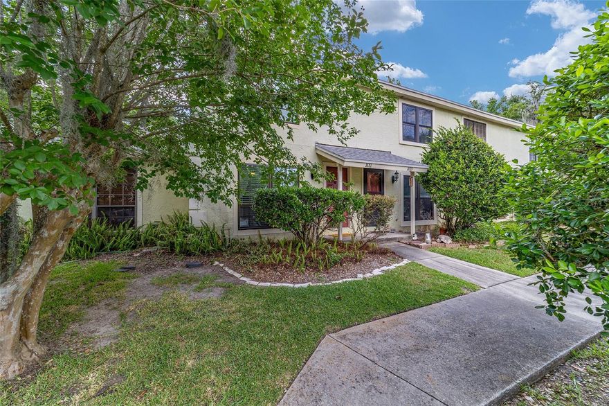 Welcome to this bright and beautifully maintained 2 bedroom, 1.5 bath villa located right in the heart of Ocala. Offering 1,054 square feet of living space, this villa offers fresh interior paint throughout. The spacious living room flows naturally into a dining area which opens to fully updated kitchen (2022) featuring white cabinetry, granite countertops and stainless appliances (2022). Upstairs you will find 2 bedrooms separated by a jack and jill bath. A convenient guest half bath is located downstairs. French doors lead to a fenced in open air patio complete with a private storage closet. Other updates include new roof (2023), new windows and french doors (2022), water heater (2020), a/c (2019). Residents enjoy access to a large pool located within the complex and a walking track is conveniently located 1 block away.. HOA dues cover roof and exterior maintenance, lawn care, trash service and pest control. In the not so distant future, the exterior of this building is scheduled for repainting. Conveniently located near medical facilities, shopping, dining and downtown Ocala, this villa offers comfortable, low-maintenance living in an unbeatable location.