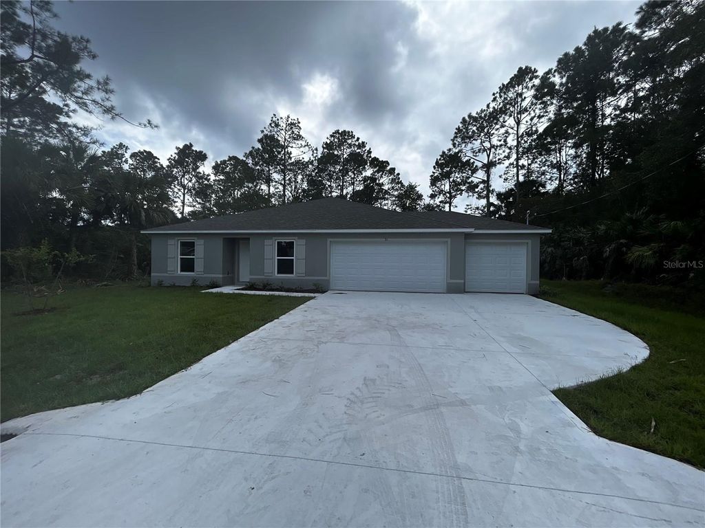 Photo of 31 Palm Leaf Lane, Palm Coast, FL 32164 (MLS # FC317882)