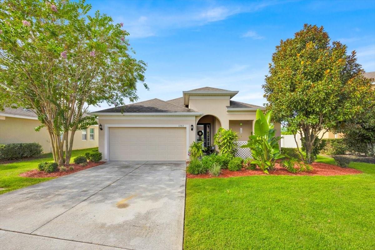 Beautifully maintained one-owner home featuring 3 bedrooms, 2 bathrooms, and an office. High ceilings and upgraded tile and LVP flooring flow throughout. The oversized kitchen offers quartz countertops and abundant storage. The primary suite includes double walk-in closets and a walk-in shower with custom bench. Additional highlights: whole-home On-Q entertainment speakers, water softener system, new water heater (2024), indoor laundry with drying rack, and bonus garage storage. All bedrooms feature walk-in closets. Enjoy the fully fenced backyard with above-ground pool plus access to the community pool.