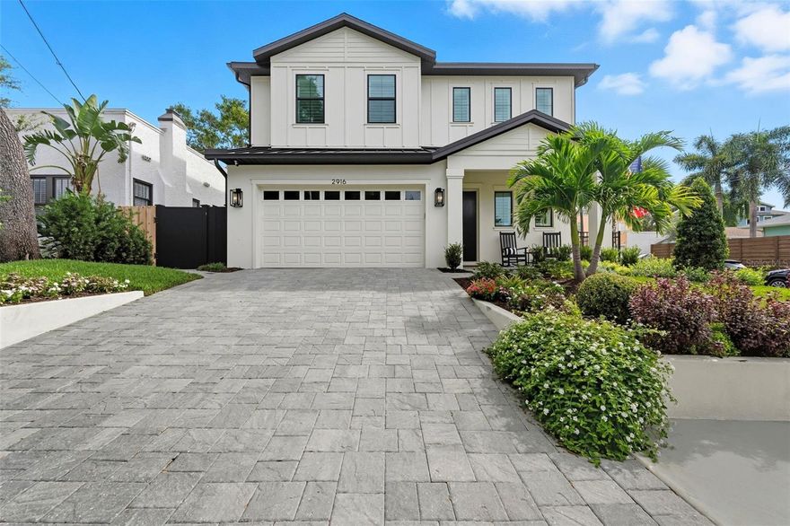 Step inside this newly completed Palma Ceia Park residence and you’ll feel the story of modern South Tampa living unfold around you. Built in 2024 and elevated with thoughtful upgrades beyond the ordinary, this five-bedroom, three-and-a-half-bath retreat weaves sophistication and comfort into every corner.

The heart of the home is its chef’s kitchen, where a striking three-inch-thick island invites friends to gather and conversations to linger. Café appliances, a seamless panel-front refrigerator, and a wine fridge tucked beside a dining room dry bar set the stage for evenings filled with laughter and effortless entertaining. Overhead, the pot filler makes even weeknight meals a luxury, while a glowing gas fireplace in the living room brings warmth and charm to the backdrop of daily life.

Just beyond the living space, walls of glass slide open to reveal a backyard sanctuary. Here, a screened salt water pool equipped with an "Endless Pool" offers both invigorating exercise and tranquil relaxation. The outdoor kitchen and turfed yard encourage weekends spent under the Florida sun, while the stackable glass doors dissolve the boundary between inside and out. Every detail is designed with ease in mind, from the safety of a pool fence to the rare convenience of a true two-car garage with generous storage for SUVs and more.

Upstairs, the expansive primary suite becomes a private haven. The spa-inspired bathroom, with its double vanities, invites slow mornings, while custom built-in closets keep life beautifully organized. Practical upgrades are woven throughout, spray-foam insulation between floors for quiet and comfort, two variable-speed AC units for efficiency, and purposeful storage solutions that make living here as easy as it is elegant.

And beyond the home, the neighborhood completes the story. Just a short distance away, CAMP and other South Tampa favorites like Bayshore Blvd are waiting to be explored. Iconic restaurants, boutiques, and gathering spots bring the city’s vibrant culture to your doorstep.

This isn’t simply a house, it is a canvas for a life well lived, where design, convenience, and location converge in one of Tampa’s most coveted communities.