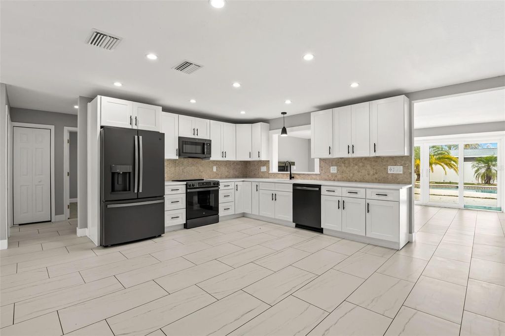 Photo of 12947 88th Avenue, Seminole, FL 33776 (MLS # GC538181)