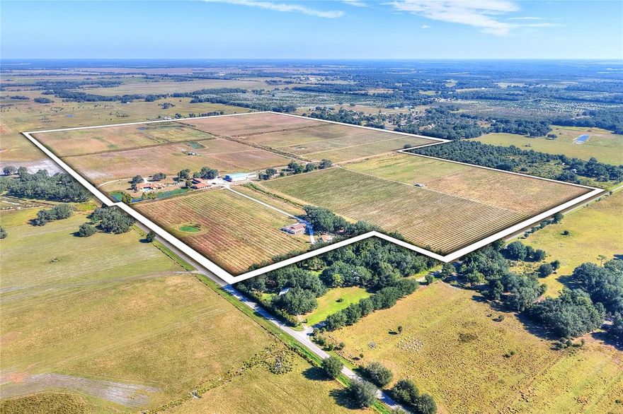 DISCOVER A UNIQUE AGRICULTURAL INVESTMENT OPPORTUNITY IN ARCADIA, FL. A sprawling 215-acre farm with 200± acres fully irrigated, designed for productivity, expansion, and versatility. Currently, 40± acres are in active production with mature dragon fruit plants ranging from 3 to 7 years old, supported by a microjet and overhead wobbler irrigation system. The remaining 160± acres are primed for crop diversification or expansion of the existing dragon fruit operation, complete with mainlines already in place. Water supply is abundant with 5 wells ranging from 2-inch to 8-inch, supported by an approved water use permit allowing an average of 508,100 gallons per day. The property includes three residences ideal for owner-operators, managers, or farm employees: a spacious 4,528 sq ft ranch-style home, a 1,698 sq ft wood-frame house, and an 1,824 sq ft mobile home. Additionally, the farm is equipped with essential operational infrastructure, including an 8,000 sq ft packing house featuring a 760 sq ft cooler and a 570 sq ft box storage area with potential to expand cooling capacity, as well as a workshop with an air-conditioned office, bathroom, and shower, which is connected to a 20-stall livestock barn, providing flexibility for livestock operations. With road frontage on three county-maintained roads, access is convenient for shipping, service providers, or future development. Whether you’re looking to expand a specialty crop operation or capitalize on the existing income-producing dragon fruit acreage, this property offers a rare blend of ready-to-operate farmland, infrastructure, and future potential.