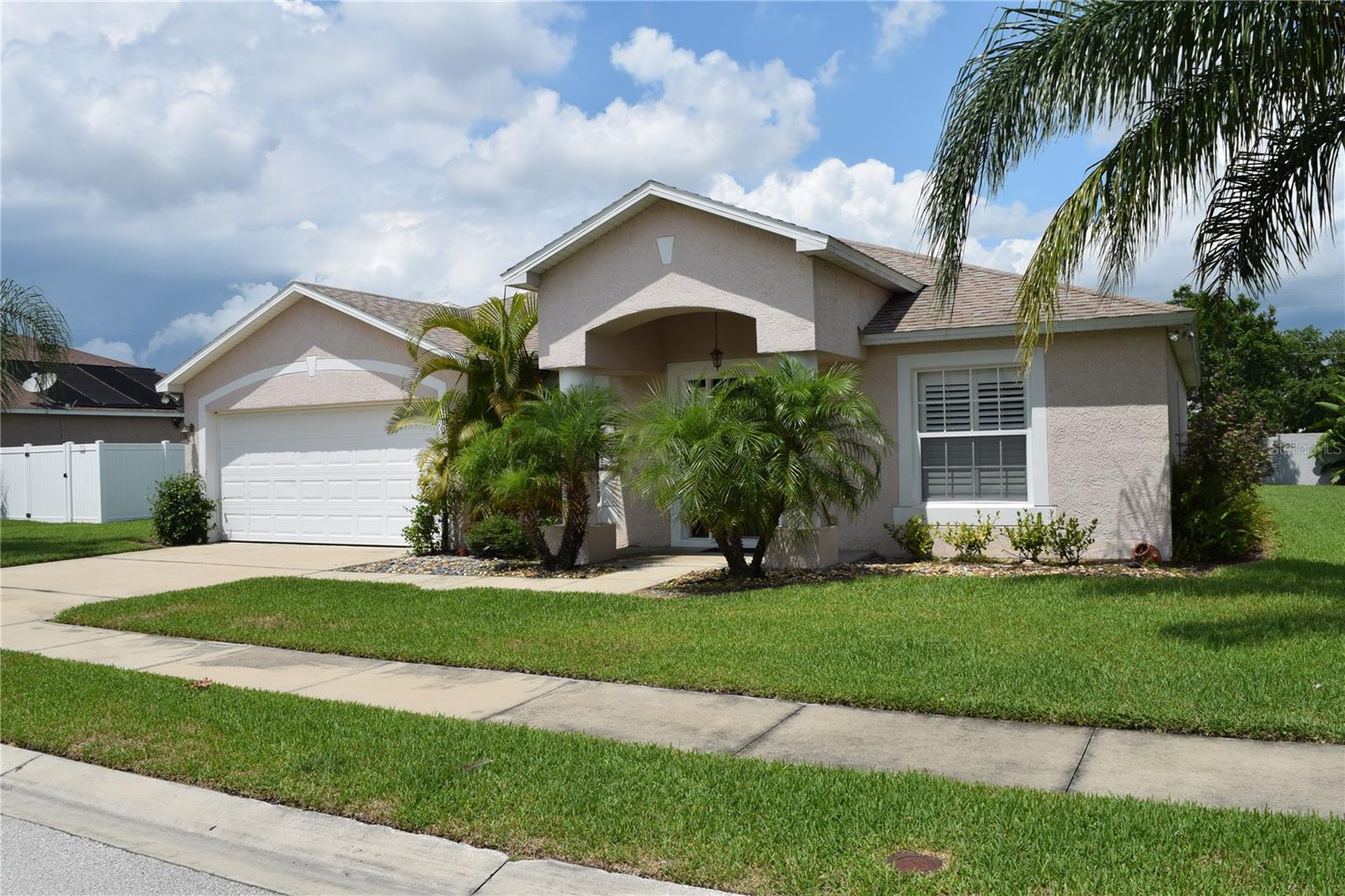 Pool & Lawn Care Included!
Welcome to this stunning 3-bedroom, 2-bath single-family pool home, featuring beautifully manicured grounds, plantation shutters, arched doorways, high ceilings, and a mix of tile and carpet flooring. The kitchen is equipped with a breakfast bar that offers ample seating, a pantry, and stainless-steel appliances, including a side-by-side refrigerator, dishwasher, microwave, and range. You'll find plenty of counter space for all your culinary needs.
The master bedroom boasts a spacious walk-in closet and an ensuite master bath with dual sink vanities. The luxurious soaking tub is surrounded by gorgeous tile that matches the walk-in shower. Please note that the washer and dryer are provided as a convenience item only, and the pool heater is not included. Sorry, no pets allowed. Tenant occupied until 9/1. Please do not disturb the tenant without a scheduled appointment.
Located in the desirable Hart Lake Cove Community, this home is just minutes away from Eagle Ridge Mall, the Flea Market, supermarkets, restaurants, and only 20 minutes from Bartow Executive Airport. Call today to view your new home! The piano and art picture frames will remain on the property.
Must See! Schedule A Viewing Today!