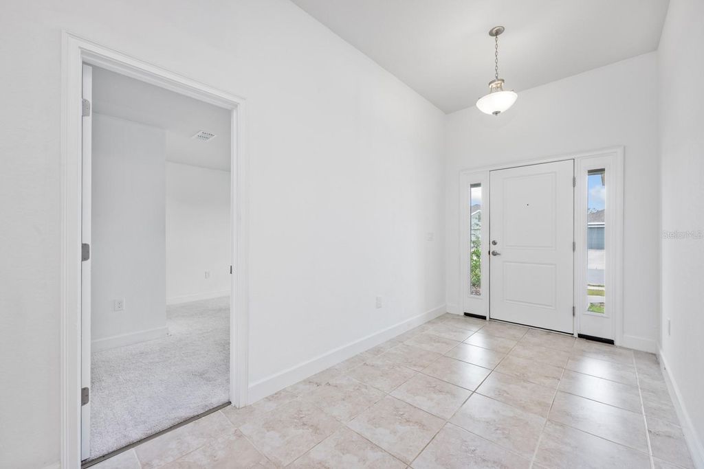 Photo of 1130 Berry Lane, Davenport, FL 33837 (MLS # O6375255)