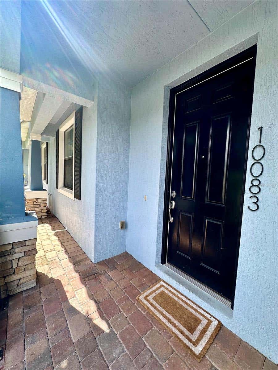 Photo of 10083 Eagle Creek Center Boulevard, Orlando, FL 32832 (MLS # S5155790)