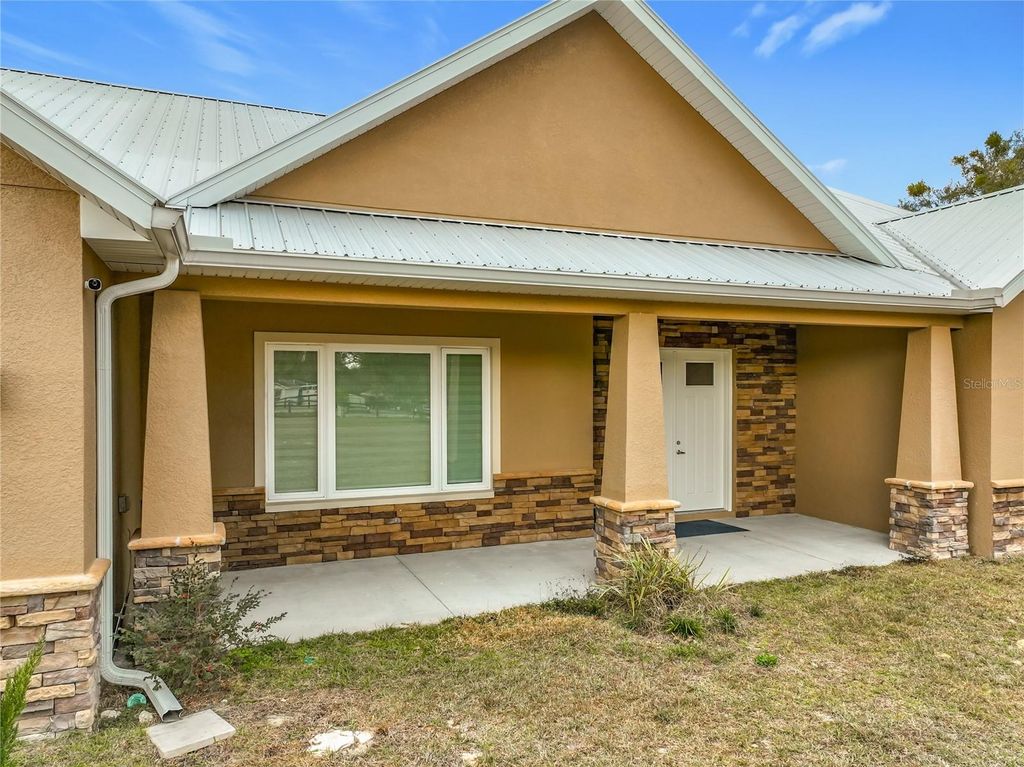 Photo of 540 NW 165th Court Road, Dunnellon, FL 34432 (MLS # W7882387)