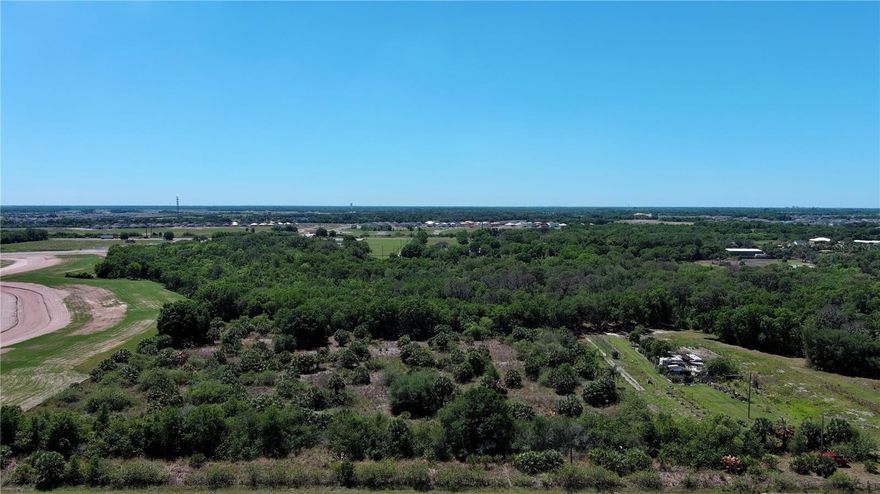 The Land You Want in the Location You Didn't Think Possible!

Embrace the essence of Florida living with this expansive parcel of land nestled in the heart of booming northern Manatee County. Spanning almost 12 acres, this property presents an exceptional opportunity for development of your dream estate and more.

Located in Palmetto, this property offers the perfect blend of tranquility and convenience. Enjoy the peaceful surroundings while being just a short drive away from all the amenities of urban living. Shopping and dining options are minutes away, ensuring you have everything you need within reach.

Property provides easy access to major cities and beaches.  Tampa, St. Pete, and Sarasota are all just a short drive away.  This property offers the ideal location for those seeking a serene retreat with the convenience of a quick commute.  

Electricity nearby, making this property ready for your vision. What's more, new resort-style communities are being built adjacent to this area, highlighting its potential for growth and investment.

Don't miss out on this rare opportunity to own a piece of paradise in northern Manatee County. Contact us today to explore the possibilities!