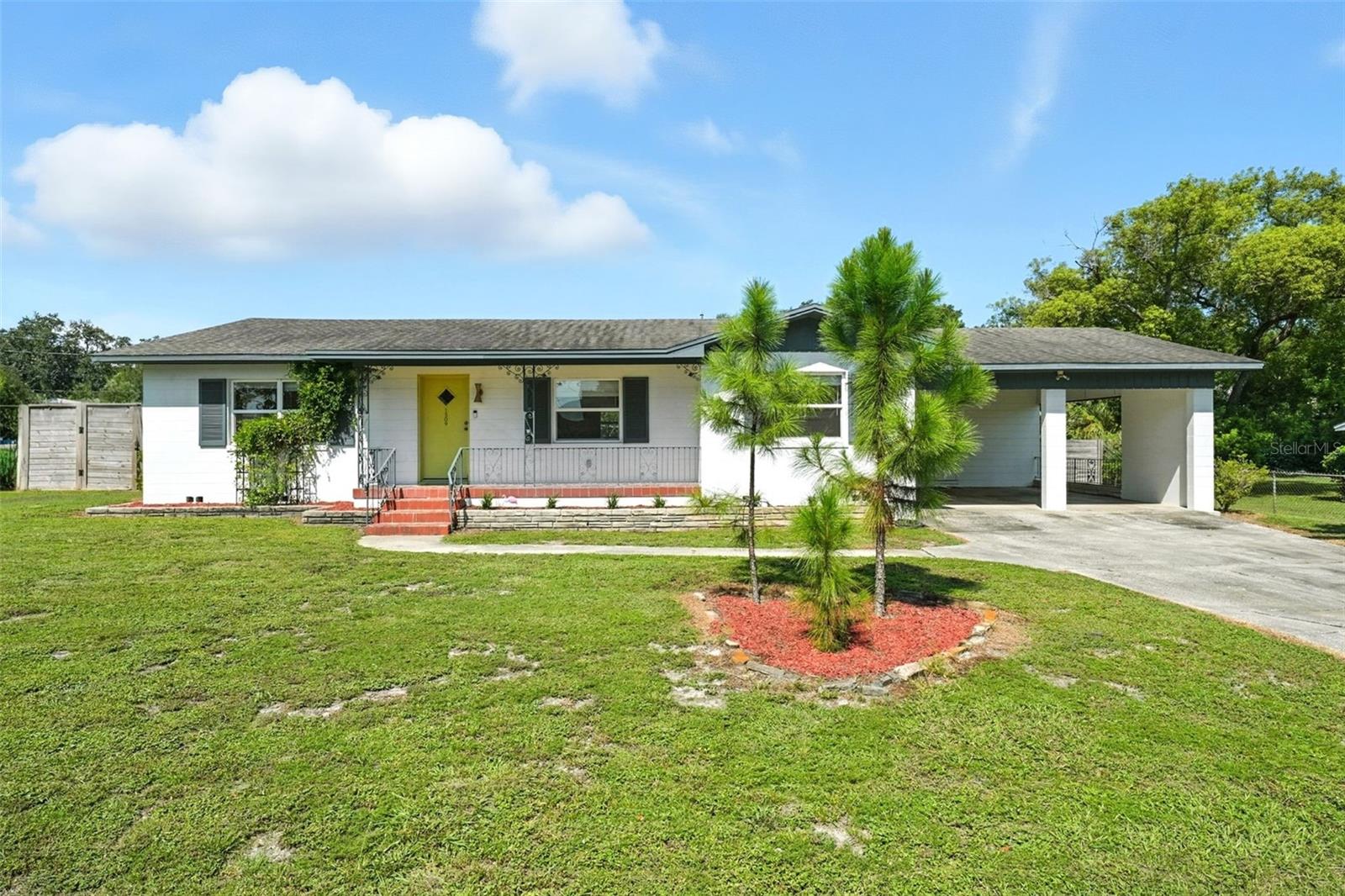 One or more photo(s) has been virtually staged. Welcome home! Located on a spacious lot in a sought-after central Lakeland location, this 3-bedroom, 2-bathroom property blends timeless mid-century character with thoughtful updates.
Step inside to find beautiful terrazzo and wood floors, an open living and dining layout, and abundant natural light. The kitchen features granite countertops, stainless steel appliances, and ample cabinetry — perfect for cooking and entertaining. The inviting front porch and covered carport add everyday convenience and charm.
Outdoors, the possibilities are endless. A pergola-covered pavered area sets the stage for gatherings, while the pretty shed offers storage or hobby space. The expansive yard is ready for gardening, play, or relaxation.
Situated near Lakeland’s scenic lakes, vibrant dining, and social activities, this home offers both tranquility and convenience. Enjoy nearby Lake Hollingsworth for walks and cycling, explore local favorites like Black & Brew Coffee House, The Joinery, and Cob & Pen, and stay connected at Southeastern University and Florida Southern College all just minutes away.
With its combination of character, updates, and location, 1509 Meadowbrook Avenue is truly a place to make your own.