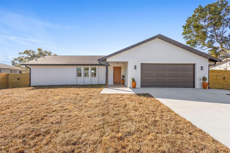 Have you ever seen a home that was renovated with “no budget” in mind? Welcome to 1972 Vienna Ave in Deltona! 

This 3-bed, 2-bath home was originally remodeled by the owner for his own loved one, meaning every single detail was hand-picked for quality and longevity. From the moment you pull up, you’ll see the difference.

Custom Everything: Custom fence gates with wheels, a custom mailbox, and a brand-new concrete driveway. 

Chef’s Dream: A stunning kitchen with quartz countertops, a pot filler, and a dedicated coffee bar station with a bar fridge. 

Total Comfort: New HVAC, new Double Pane Low E windows, brand-new electrical panel with a generator outlet and roof only 4 years old (June 2022). 

Luxury Living: Wood tile floors flow throughout the entire home—including the garage! No popcorn ceilings, no old carpet, and no "builder-grade" shortcuts. This is a custom-build experience at a Deltona price point.