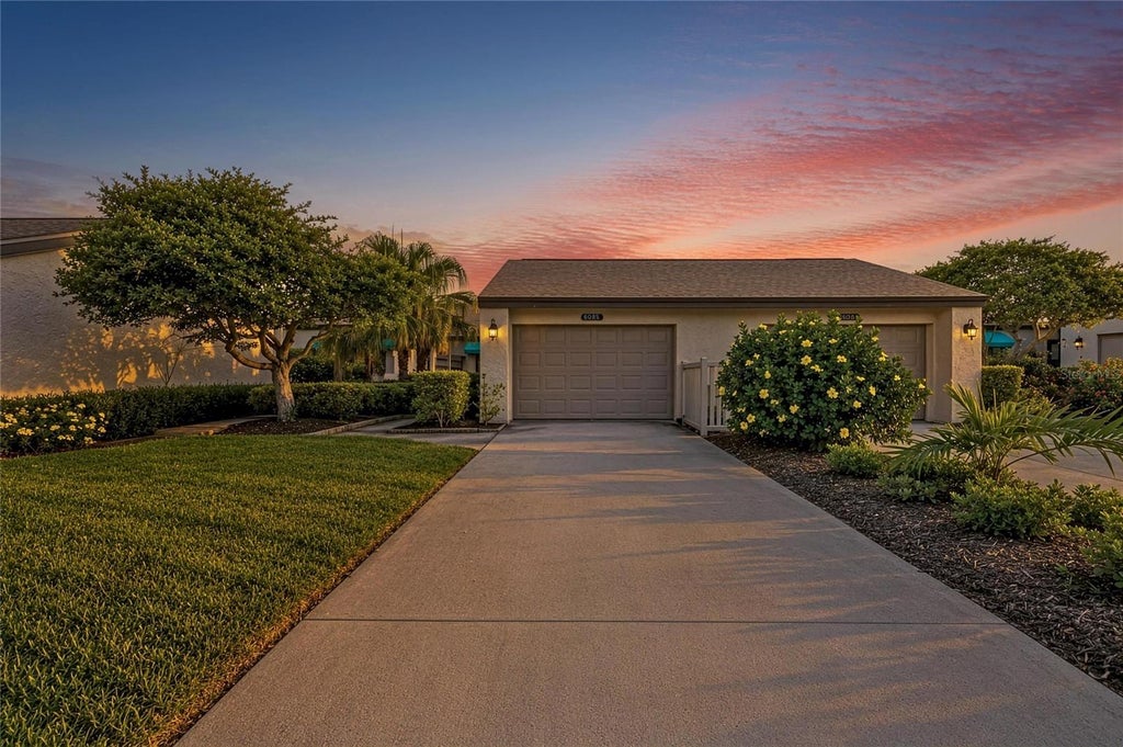 Photo of 6085 Clubside Drive, Sarasota, FL 34243 (MLS # A4702794)